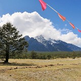 Jade Dragon Snow Mountain  Jade Dragon Snow Mountain rises majestically behind the city of Lijiang and makes for a great day trip. Wouldn't it have been raining most of the day, there would also be some good walks - when I went, the blue sky only showed in the late afternoon...